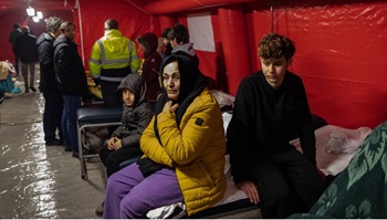 Earthquake survivors in a medical tent